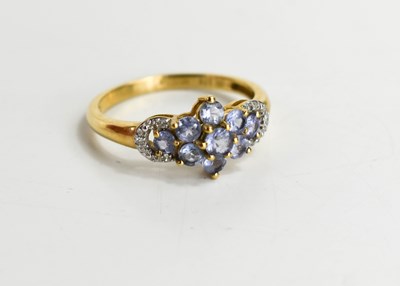 Lot 108 - A 9ct gold amethyst and diamond flowerhead...