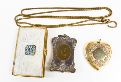 Lot 205 - Two French chatelaine pendants; a heart form...