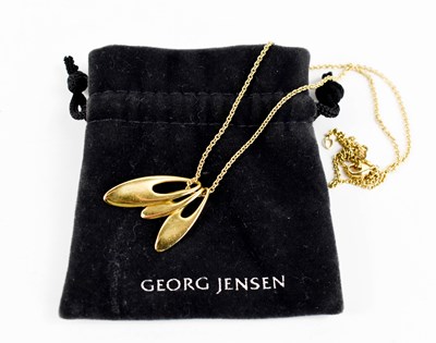 Lot 15 - A Georg Jensen 18ct gold triple pendant...