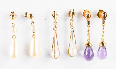 Lot 200 - Two pairs of 9ct gold and pearl drop earrings,...