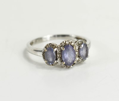 Lot 110 - A 9ct white gold and lavender amethyst and...