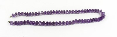 Lot 161 - An amethyst beaded necklace, each bead...