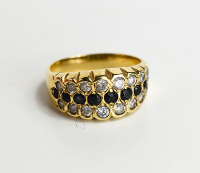 Lot 62 - A 9ct gold sapphire and white stone set ring,...