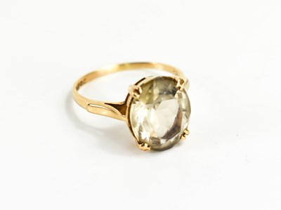 Lot 164 - A 9ct gold and smoky quartz ring, size M, 2.46g.