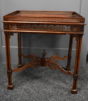 Lot 545 - A mahogany fret work carved Chippendale-style...