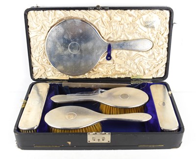 Lot 396 - A silver dressing table set, comprising mirror,...