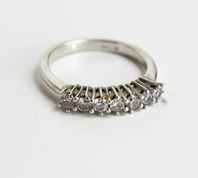 Lot 113 - A 9ct white gold and diamond seven stone ring,...