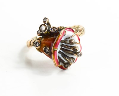 Lot 2 - A gold, enamel and diamond ring in the form of...
