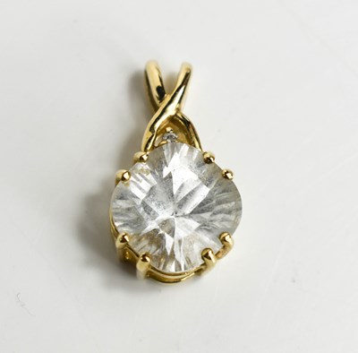 Lot 93 - A glacier topaz and diamond pendant, the topaz...
