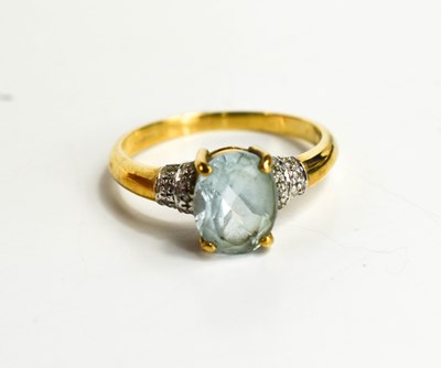 Lot 106 - A 9ct gold, aquamarine and diamond ring, the...