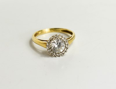 Lot 107 - A 14 ct gold and white stone ring, single...