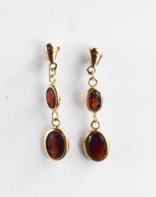 Lot 194 - A pair of 9ct gold and garnet drop earrings,...