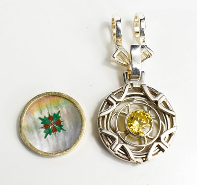 Lot 30 - A silver locket pendant, by jewellery designer...
