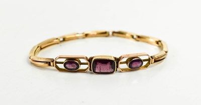 Lot 7 - A 9ct rose gold bracelet set with three...