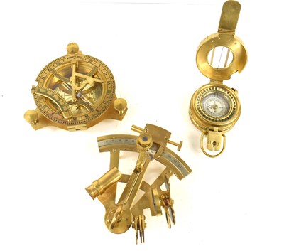 Lot 185 - A brass nautical style compass together with a...