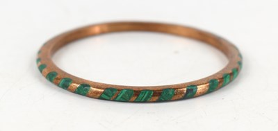 Lot 172 - A 9ct gold and malachite set bangle, 31.6g