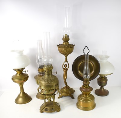 Lot 169 - An Art Nouveau oil lamp in the form of a...