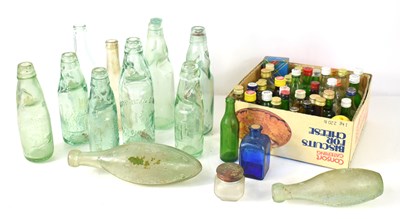 Lot 224 - A group of codd and torpedo glass bottles to...