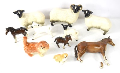 Lot 286 - A group of ceramic animals to include examples...