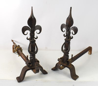 Lot 187 - A pair of French cast and wrought iron fire...