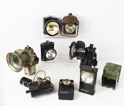 Lot 241 - A group of night watchmen and vehicle lamps to...