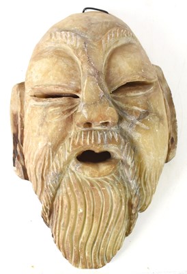 Lot 326 - A Chinese carved soapstone Confucius face mask,...