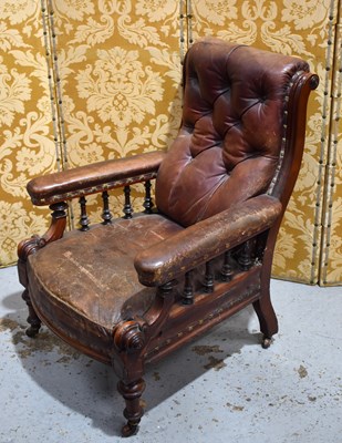 Lot 530 - A Victorian library arm chair, with scrolled...