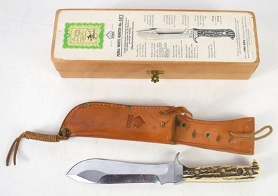 Lot 70 - A vintage Puma 'Scout's White Hunter knife,...