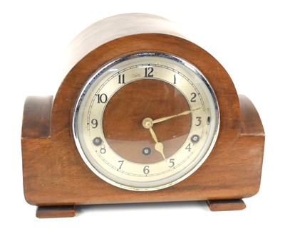 Lot 227 - An Art Deco mahogany cased mantle clock, of...