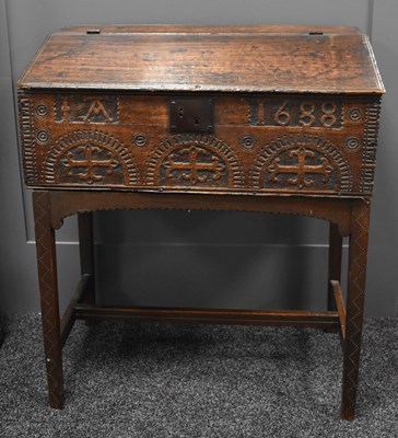 Lot 555 - A 17th century oak bible box on stand, the...