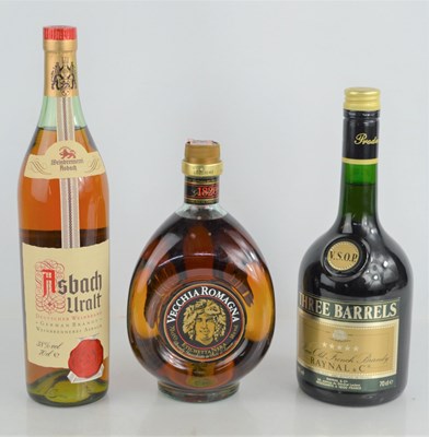 Lot 344 - Three bottles of brandy to include Raynal & Co...