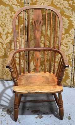 Lot 531 - A 19th century Windsor armchair, the hoop back...