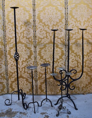 Lot 191 - A selection of wrought iron pricket sticks to...