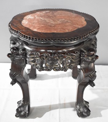 Lot 325 - A 19th century Chinese hardwood jardiniere...