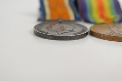 Lot 16 - A group of two WWI medals awarded to PTE J....