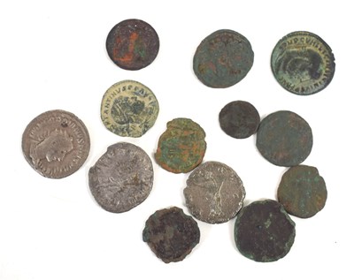 Lot 97 - A small group of Roman coins to include...