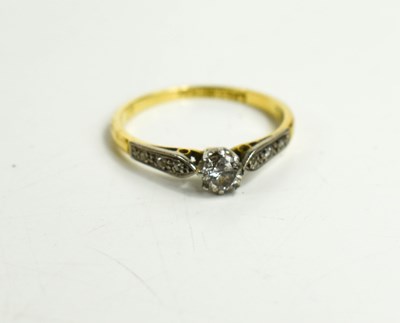 Lot 115 - An 18ct gold and platinum diamond solitaire...