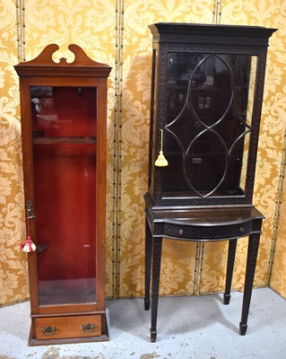 Lot 524 - An Edwardian mahogany and glass fronted three...