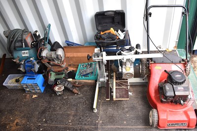 Lot 495 - A large group of tools to include a petrol...