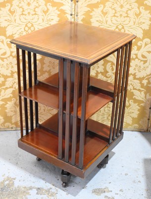 Lot 516 - An Edwardian mahogany revolving bookcase, the...