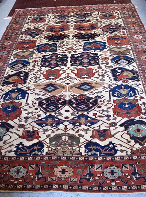 Lot 457 - A large rug, possibly Afghan, the cream...