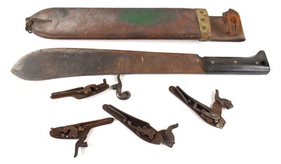 Lot 286 - A WWII army issued machete housed in leather...