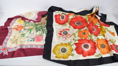 Lot 260 - A Gucci silk scarf with floral decoration by V....