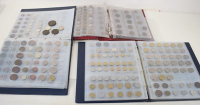 Lot 100a - Three coin albums containing GB and worldwide...