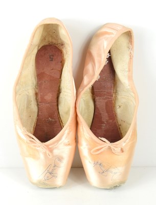 Lot 245 - A pair of ballet pointe shoes both signed by...