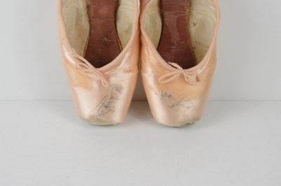 Lot 245 - A pair of ballet pointe shoes both signed by...