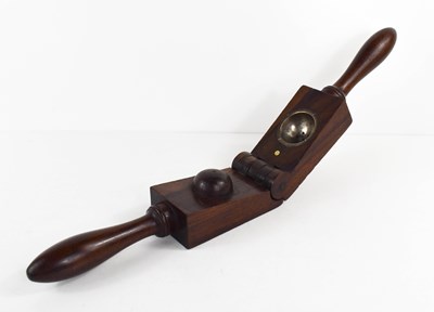 Lot 16 - A treen fruit press, likely rosewood, the two...