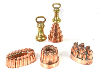 Lot 244 - A group of four Victorian copper jelly moulds,...