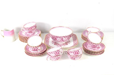 Lot 132 - A 19th century part tea set, pink primrose...