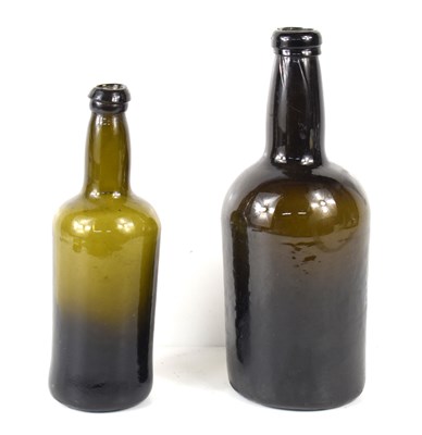 Lot 162 - A George III olive green glass wine bottle...